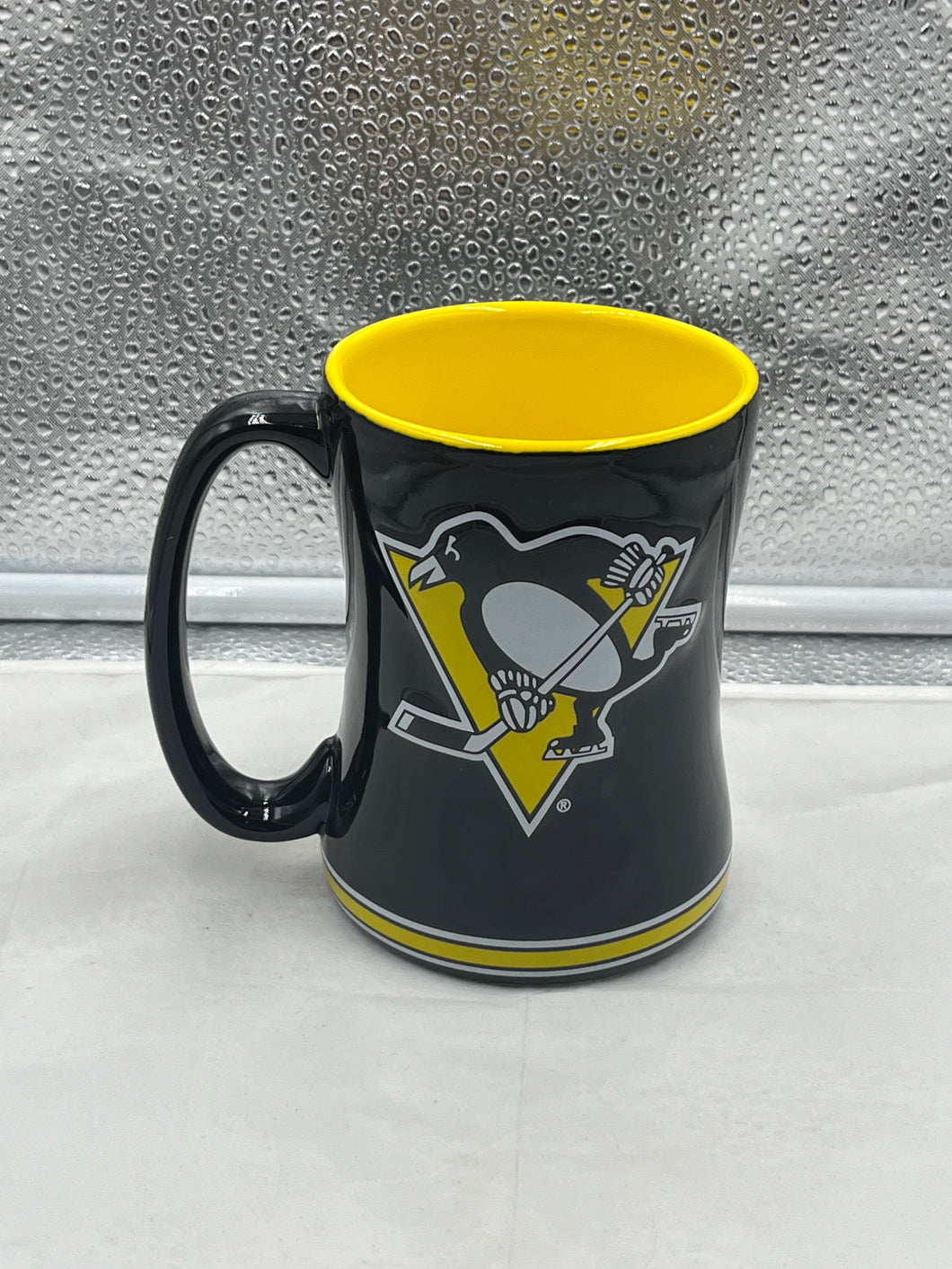 Pittsburgh Penguins NHL Logo Brands 14oz Mug featuring iconic black and gold team logo, perfect for hockey fans.