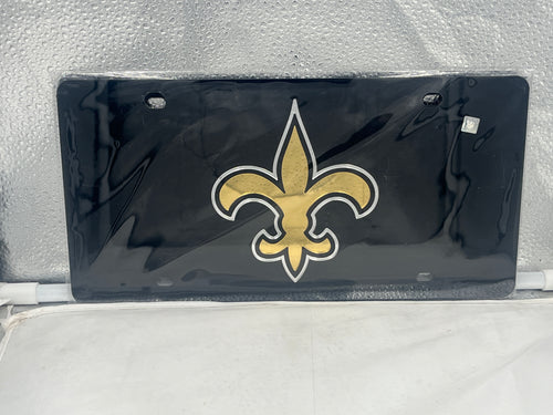 New Orleans Saints NFL Black Reflective Lasercut License Plate by WinCraft showcasing the iconic team logo with reflective surface, perfect for displaying team pride on vehicles.