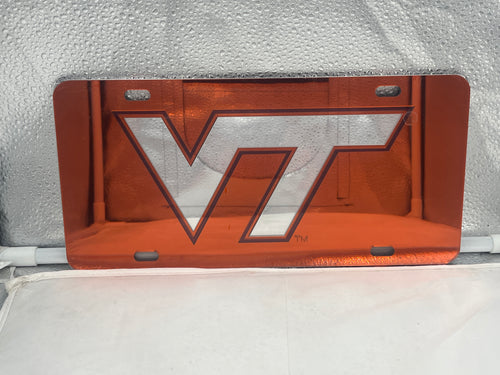 Virginia Tech Hokies NCAA Orange Mirrored Laser Cut License Plate by Craftique showcasing a vibrant orange finish and iconic Hokies logo, designed to add school spirit and flair to any vehicle.