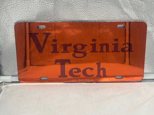 Virginia Tech Hokies NCAA Orange Mirrored Laser Cut License Plate from Craftique showcasing vibrant orange color and laser-cut details, perfect for expressing team spirit on your vehicle.