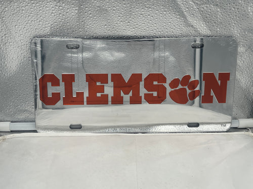 Clemson Tigers NCAA Silver Mirrored Laser Cut License Plate by Craftique, showcasing a sleek design with the iconic Tigers logo, perfect for any vehicle.