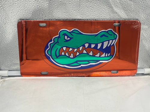 Florida Gators NCAA Orange Mirrored Laser Cut License Plate by Craftique, showcasing the vibrant orange mirrored finish and iconic Florida Gators logo, perfect for car accessories.