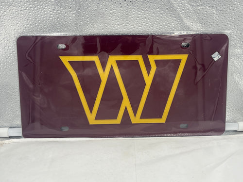 Washington Commanders NFL Red Reflective Lasercut License Plate by WinCraft showcasing the team's logo with a stylish design and reflective finish, perfect for displaying team pride on vehicle.