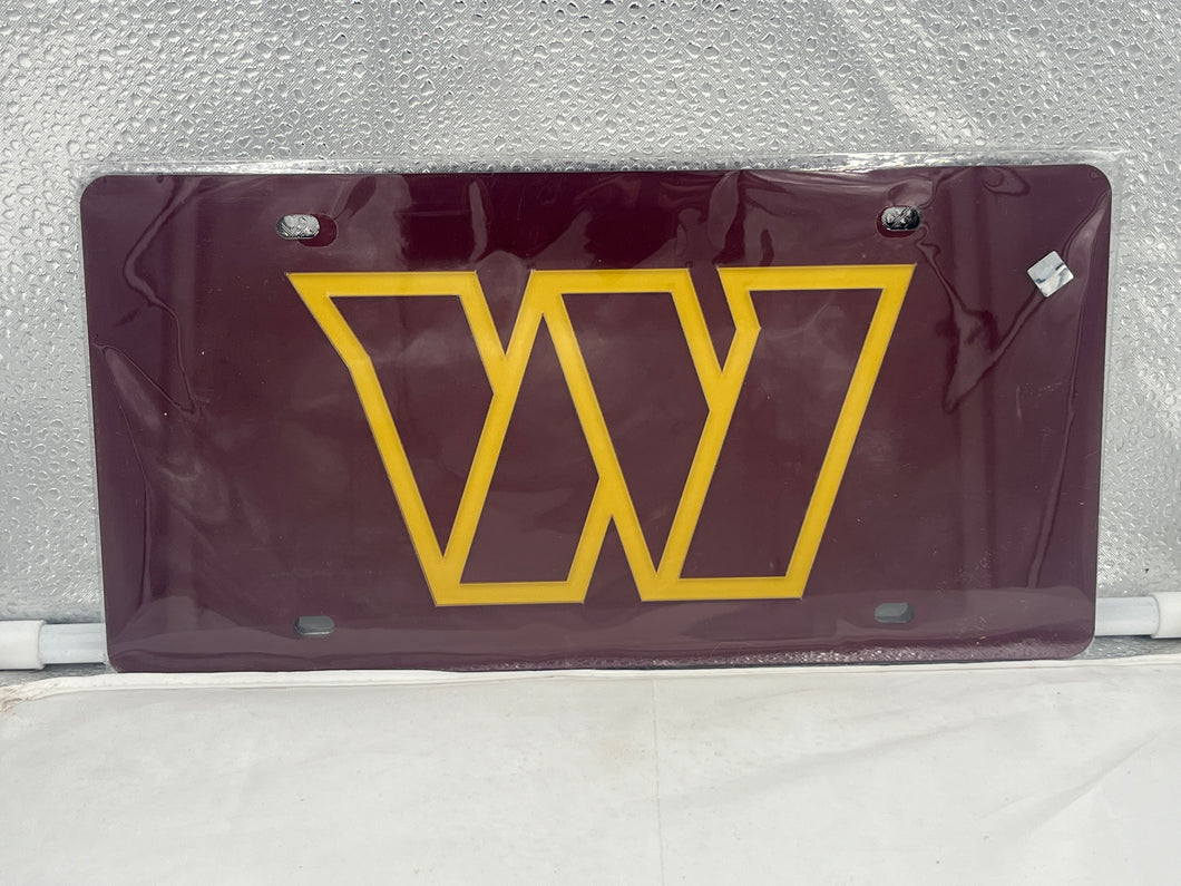 Washington Commanders NFL Red Reflective Lasercut License Plate by WinCraft showcasing the team's logo with a stylish design and reflective finish, perfect for displaying team pride on vehicle.