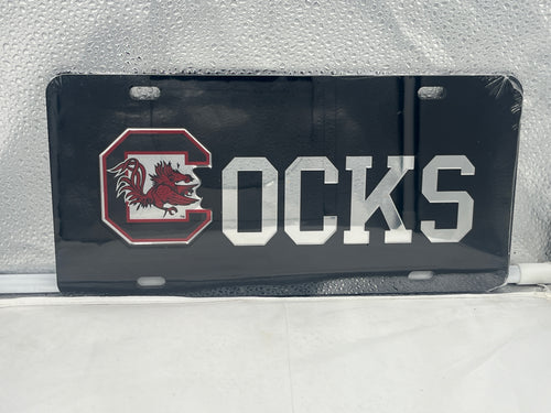 South Carolina Gamecocks NCAA Black Mirrored Laser Cut License Plate by Craftique showcasing an eye-catching design with a sleek mirrored finish, perfect for vehicle display and team pride.