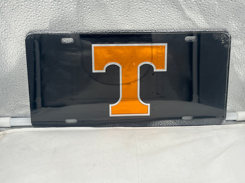Tennessee Volunteers NCAA Black Mirrored Laser Cut License Plate by Craftique featuring a sleek design and vibrant team logo, perfect for showcasing team spirit on your vehicle.