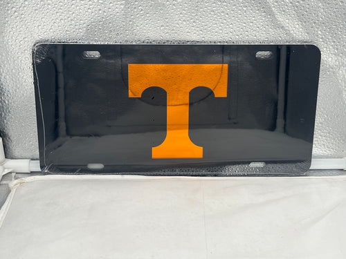 Tennessee Volunteers NCAA Black Mirrored Laser Cut License Plate by Craftique showcasing high-quality materials and unique design, perfect for fans to displayed team loyalty.