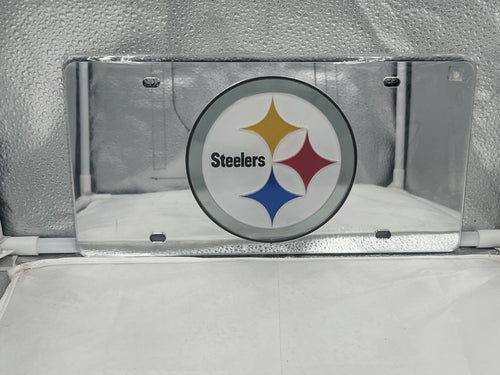 Pittsburgh Steelers NFL Silver Reflective Lasercut License Plate by WinCraft, showcasing the team's logo in a sleek silver finish, ideal for vehicle styling and fan representation.