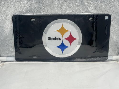 Pittsburgh Steelers NFL Black Reflective Lasercut License Plate from WinCraft showcasing durable construction and sleek design, perfect for displaying team spirit on your vehicle.