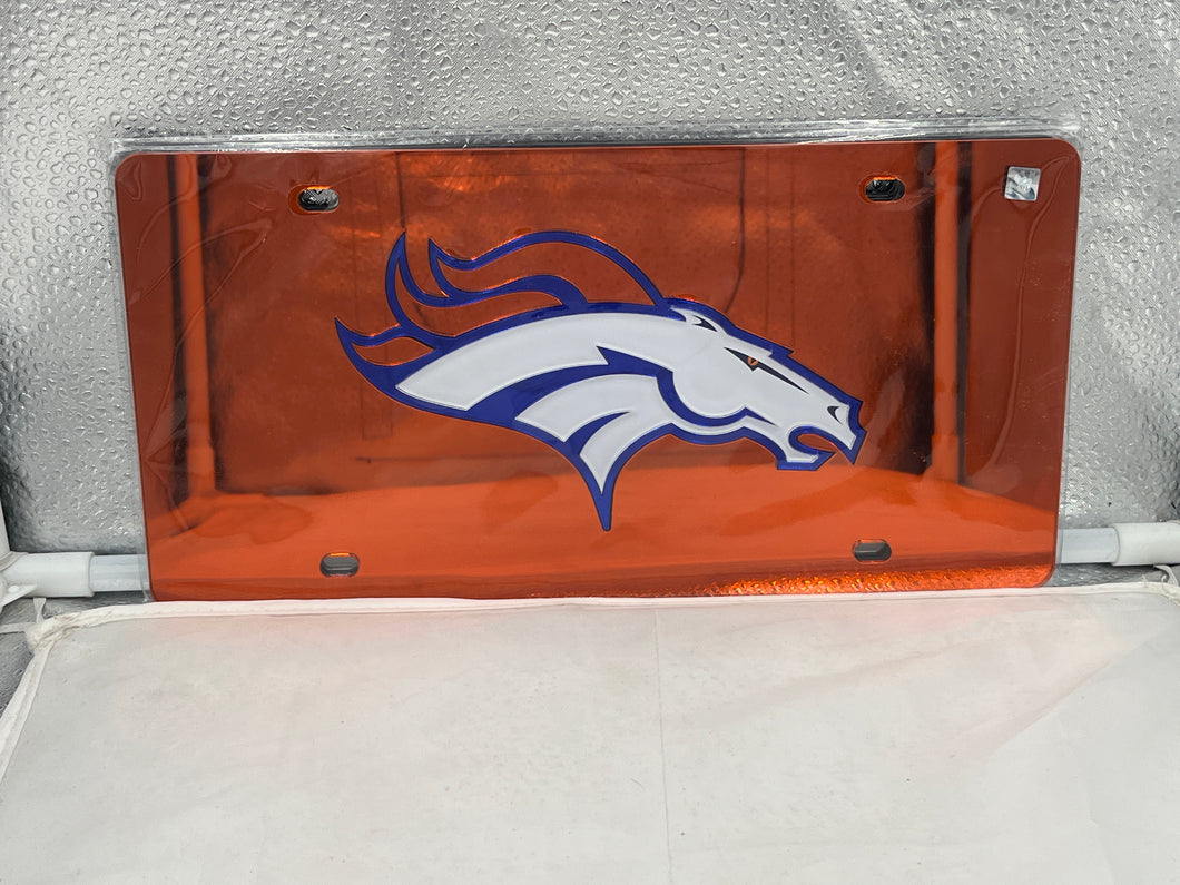 Denver Broncos NFL Orange Reflective Lasercut License Plate by WinCraft, showcasing a vibrant orange color and reflective design with the team logo, perfect for expressing team spirit on vehicles.