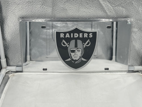 Las Vegas Raiders NFL Silver Reflective Lasercut License Plate by WinCraft showcasing the iconic Raiders logo in a shiny, durable design perfect for vehicle decoration and team spirit.