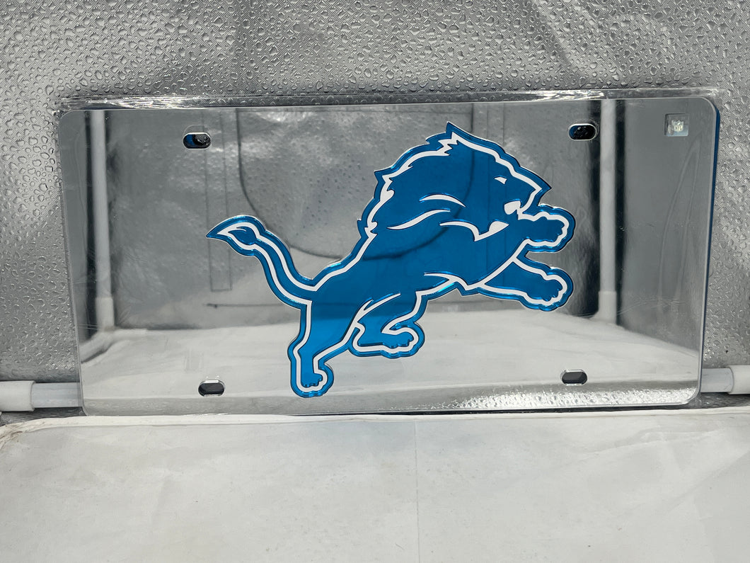 Detroit Lions NFL Silver Acrylic Lasercut License Plate by WinCraft showcasing a detailed lasercut logo design and sleek silver finish ideal for vehicle decor or home display.