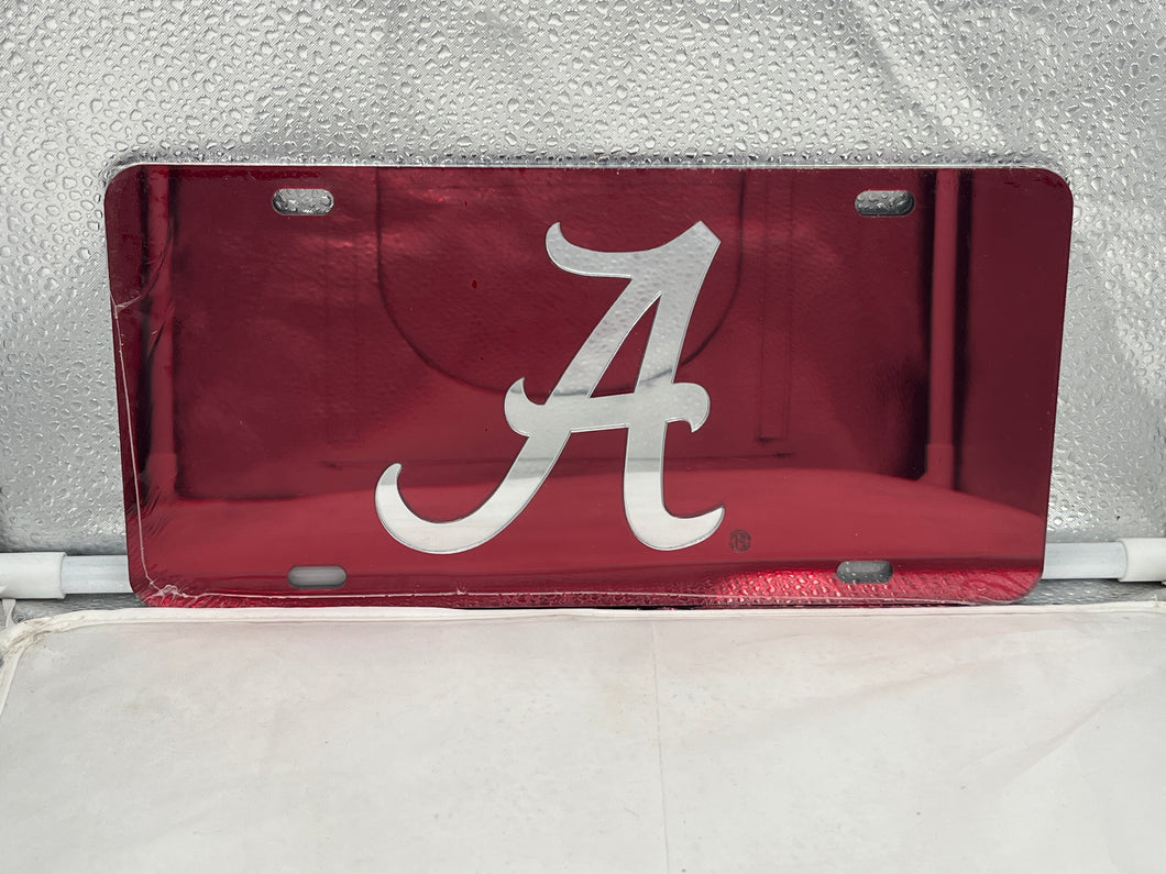 Alabama Crimson Tide NCAA Red Mirrored Laser Cut License Plate by Craftique, showcasing bold design and high-quality construction for die-hard fans.