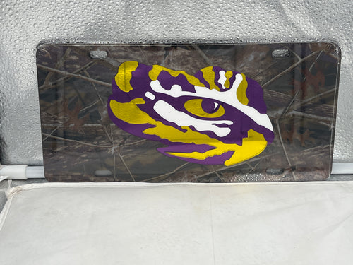 LSU Tigers NCAA Camo Mirrored Laser Cut License Plate Craftique showcasing a unique camo design with a mirrored finish, perfect for LSU fans to display team spirit.