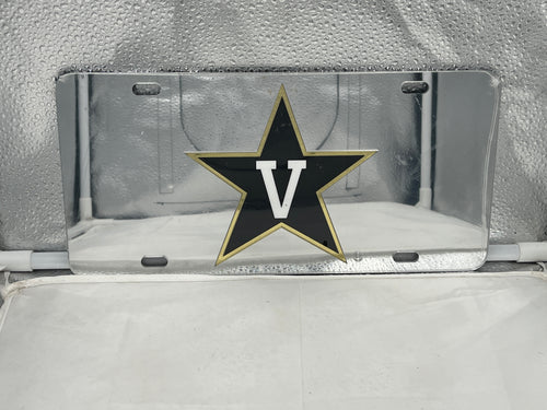 Vanderbilt Commodores NCAA Silver Mirrored Laser Cut License Plate from Craftique, featuring a sleek mirrored finish and precision laser-cut design, perfect for showcasing team pride on vehicles or as unique decor.