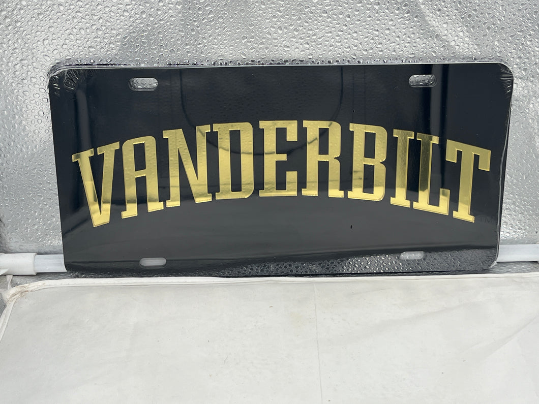 Vanderbilt Commodores NCAA Black Mirrored Laser Cut License Plate by Craftique showcasing its sleek design and iconic logo for fans