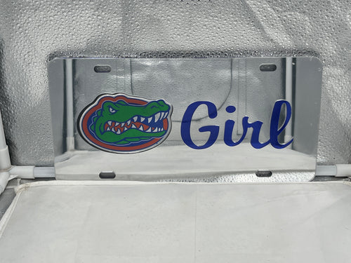Florida Gators NCAA Silver Mirrored Laser Cut License Plate by Craftique featuring a stylish mirrored finish and intricate laser-cut logo design, perfect for showcasing school spirit on your vehicle.