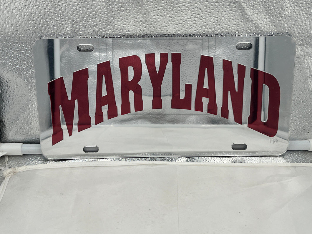 Maryland Terrapins NCAA Silver Mirrored Laser Cut License Plate by Craftique, featuring a durable design with a stunning silver mirrored finish and iconic logo for team spirit on vehicles.