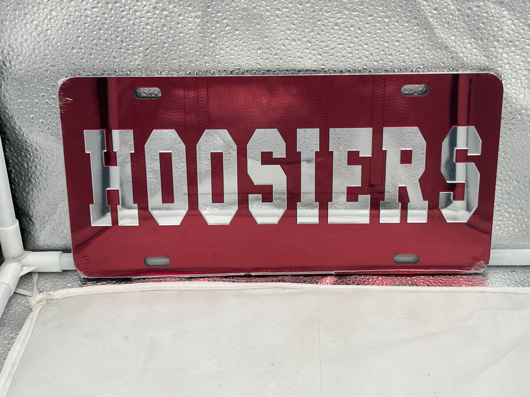 Indiana Hoosiers NCAA Red Mirrored Laser Cut License Plate by Craftique, showcasing vibrant red color, reflective design, and laser-cut Hoosiers logo, perfect for displaying team spirit on vehicles.