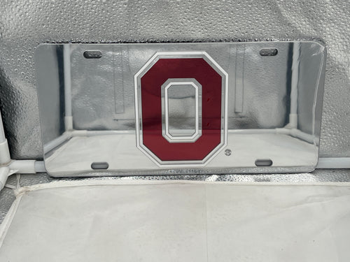 Ohio State Buckeyes NCAA Silver Mirrored Laser Cut License Plate by Craftique displaying the iconic team logo with a striking silver mirrored finish, perfect for showcasing support for the Buckeyes on vehicles.