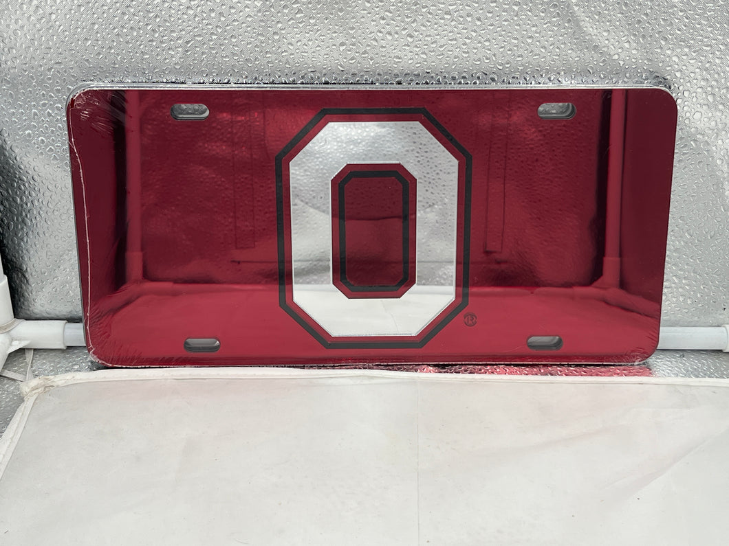 Ohio State Buckeyes NCAA Red Mirrored Laser Cut License Plate by Craftique showcasing vibrant red color with polished mirrored finish, designed for passionate fans to display their school spirit and pride.