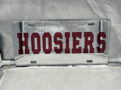 Indiana Hoosiers NCAA Silver Mirrored Laser Cut License Plate from Craftique showing the team's logo with a stylish mirrored finish, perfect for enhancing vehicle aesthetics and displaying team pride.