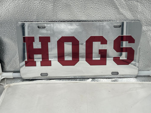 Arkansas Razorbacks NCAA Silver Mirrored Laser Cut License Plate from Craftique, perfect for displaying team spirit with a sleek silver finish. Ideal for fans of the Arkansas Razorbacks license plate.