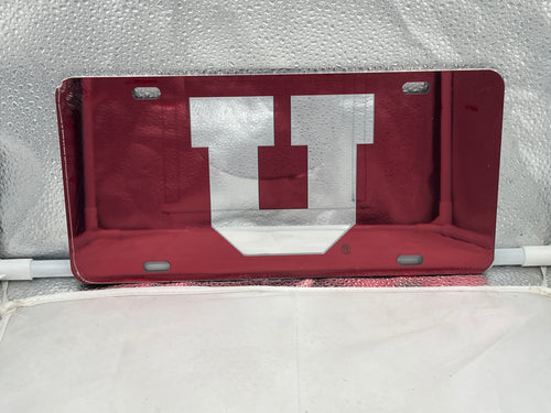 Utah Utes NCAA Red Mirrored Laser Cut License Plate by Craftique showcasing a vibrant red color and laser-cut design featuring the Utah Utes logo.