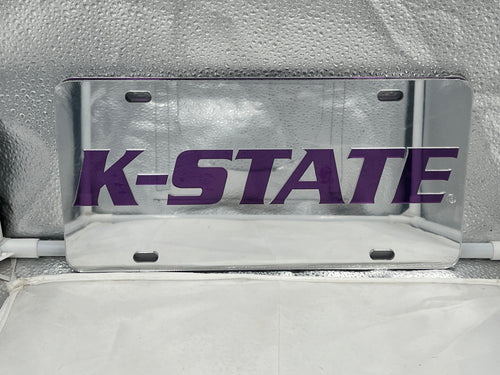 Kansas State Wildcats NCAA Silver Mirrored Laser Cut License Plate from Craftique showcasing a reflective surface and detailed laser cut design, perfect for displaying team spirit on vehicles.