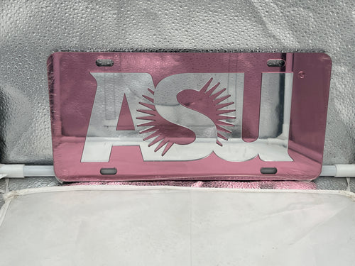 Arizona State Sun Devils NCAA Pink Mirrored Laser Cut License Plate Craftique. Show your team spirit with this vibrant Arizona State license plate featuring a stylish mirrored design.