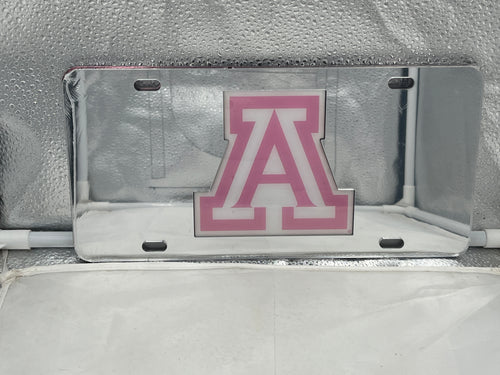 Arizona Wildcats NCAA Silver Mirrored Laser Cut License Plate from Craftique showcases a sleek silver mirrored finish with intricate laser cut design, featuring the Arizona Wildcats logo, perfect for displaying team spirit on your vehicle.