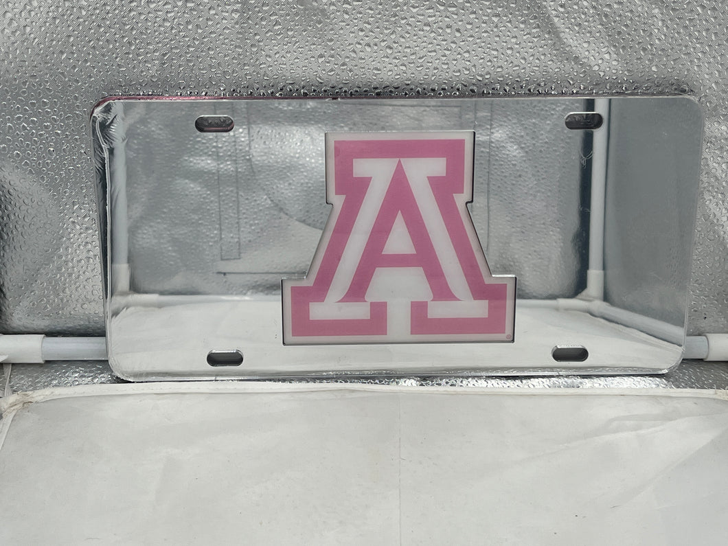 Arizona Wildcats NCAA Silver Mirrored Laser Cut License Plate from Craftique showcases a sleek silver mirrored finish with intricate laser cut design, featuring the Arizona Wildcats logo, perfect for displaying team spirit on your vehicle.