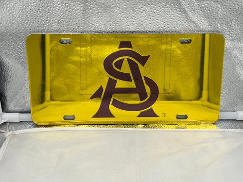 Arizona State Sun Devils NCAA Yellow Mirrored Laser Cut License Plate Craftique, showcasing a vibrant yellow design and laser-cut logo, perfect for fans wanting to display their Arizona State Sun Devils license plate for added style on their vehicle.