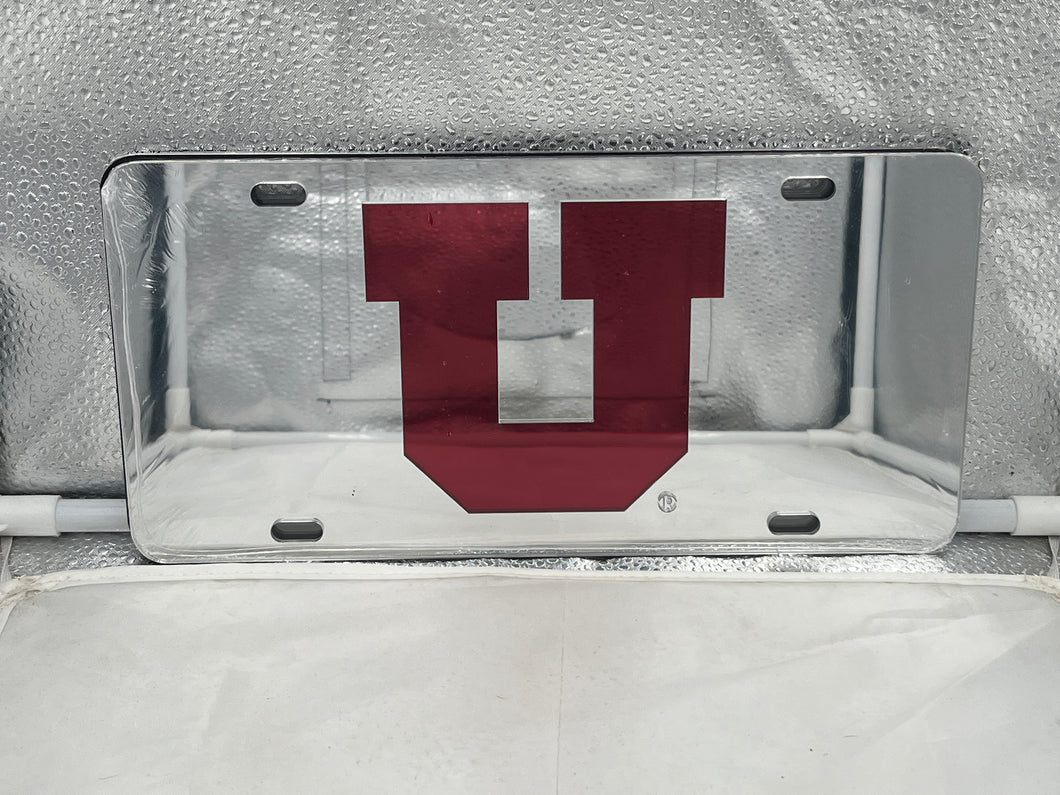 Utah Utes NCAA Silver Mirrored Laser Cut License Plate by Craftique showcasing detailed laser-cut design and elegant silver finish, perfect for automobile styling and expressing team loyalty.