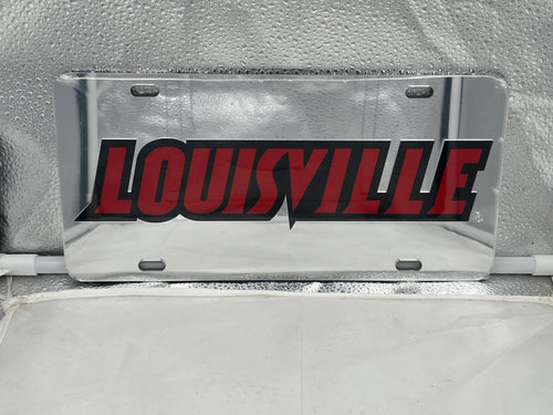 Louisville Cardinals NCAA Silver Mirrored Laser Cut License Plate by Craftique, showcasing a stunning silver finish and laser-cut logo design for durable and stylish team spirit.