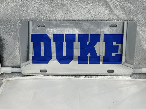 Duke Blue Devils NCAA Silver Mirrored Laser Cut License Plate by Craftique showing stylish design and logo, perfect for car accessories and fan decor.