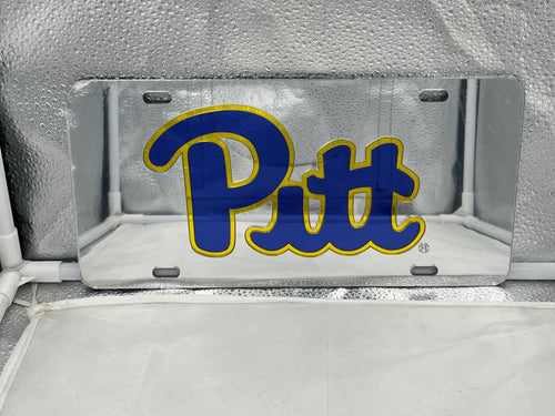 Pitt Panthers NCAA Silver Mirrored Laser Cut License Plate by Craftique displaying a sleek and stylish design, perfect for showcasing team spirit on any vehicle.