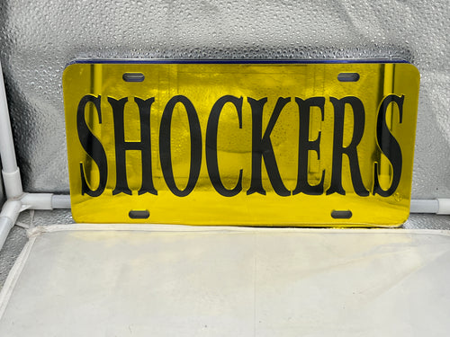 Wichita State Shockers NCAA Yellow Mirrored Laser Cut License Plate from Craftique showcasing vibrant colors and intricate logo design, perfect for sports fans.