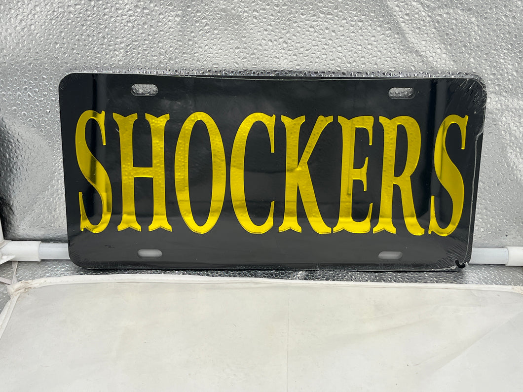 Wichita State Shockers NCAA Black Mirrored Laser Cut License Plate by Craftique showcasing a modern design with sleek black finish and mirrored laser cut details, perfect for displaying school pride on vehicles.