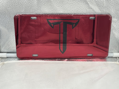 Troy Trojans NCAA Red Mirrored Laser Cut License Plate by Craftique showcasing vibrant red and mirrored finishes, designed for fans to display their school spirit on their vehicles.