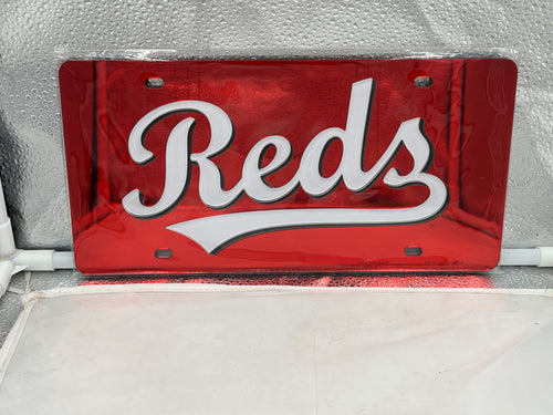 Cincinnati Reds MLB Lasercut Acrylic License Plate showcasing a durable red design by WinCraft, perfect for displaying team spirit on vehicles.