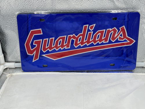 Cleveland Guardians MLB Blue Acrylic Lasercut License Plate by WinCraft, featuring vibrant blue color and intricate lasercut design showcasing team logo, perfect for expressing team pride on any vehicle.