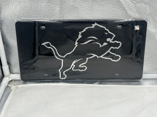 Detroit Lions NFL Black Acrylic Lasercut License Plate by WinCraft showcasing the iconic Detroit Lions logo in a durable and stylish design.