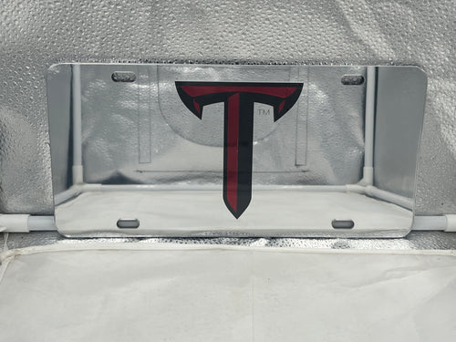 Troy Trojans NCAA Silver Mirrored Laser Cut License Plate by Craftique showcasing a sleek silver mirrored finish and durable laser-cut design, perfect for expressing team pride on your vehicle.