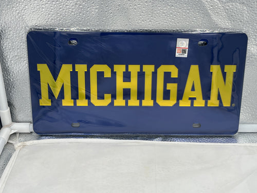 Michigan Wolverines NCAA Blue Acrylic Laser Cut License Plate from WinCraft showcasing vibrant blue color and iconic logo, perfect for fans and alumni to display team pride.