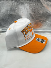 Load image into Gallery viewer, Model wearing the Tennessee Volunteers NCAA &#39;47 Brand White TT Hitch Rope Adjustable Snapback Hat while attending a game, demonstrating its versatility as fan gear.
