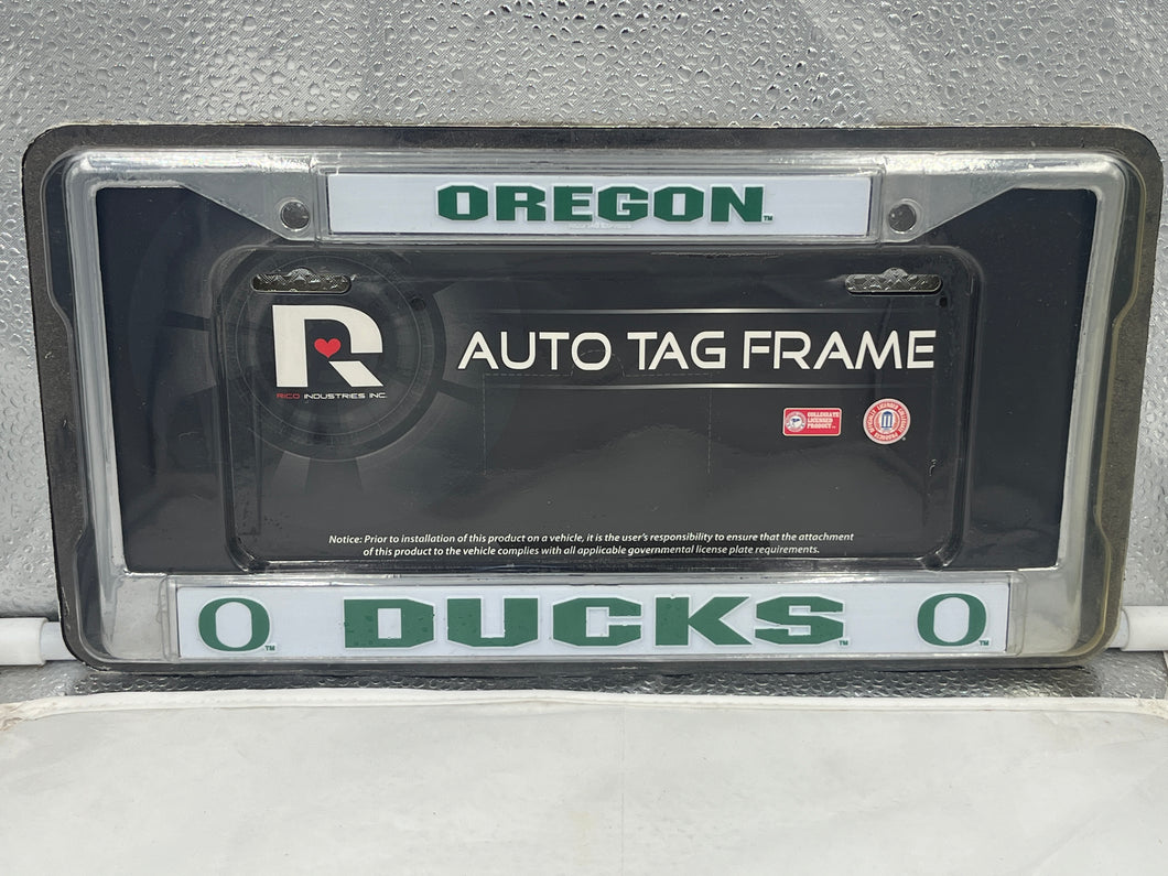 Oregon Ducks NCAA Chrome License Plate Frame by RICO showcasing vibrant team colors and logo, perfect for displaying Oregon Ducks pride on your vehicle.