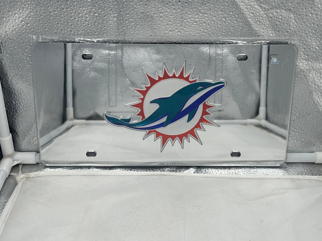 Miami Dolphins NFL Silver Reflective Lasercut License Plate from WinCraft showcasing team spirit with a sleek reflective finish and lasercut design, perfect for enhancing vehicle appearance and visibility.