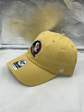 Load image into Gallery viewer, Close-up view of the Florida State Seminoles FSU NCAA &#39;47 Brand Gold Clean Up Adjustable Hat emphasizing the iconic FSU logo.
