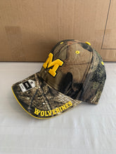 Load image into Gallery viewer, Michigan Wolverines NCAA Fan Favorite Mossy Oak Camo Adjustable Hat - Casey&#39;s Sports Store
